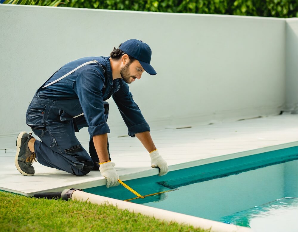 man getting started on pool inspections